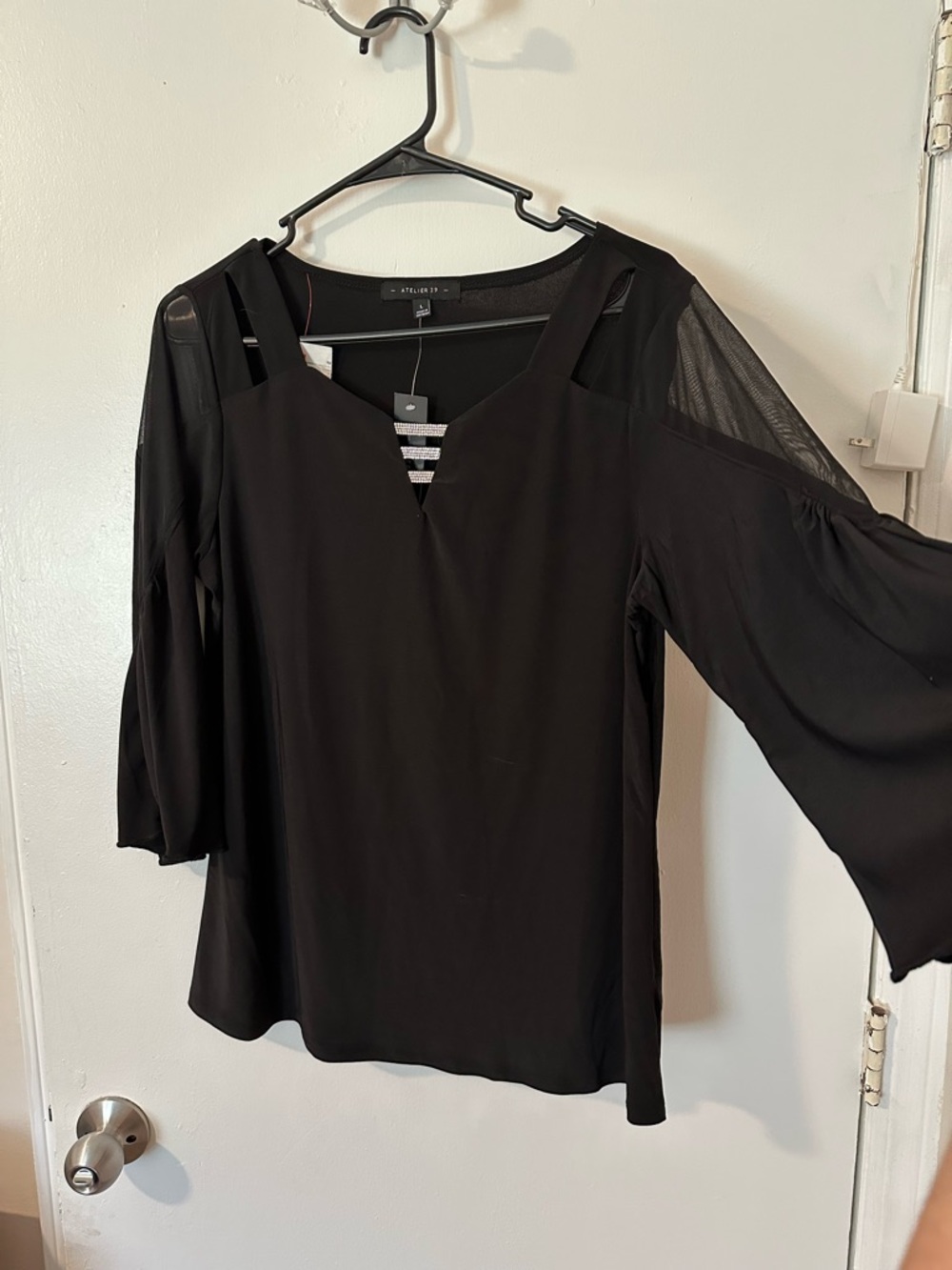 Stylish Black Cold-Shoulder Blouse with Sheer Sleeve Accents